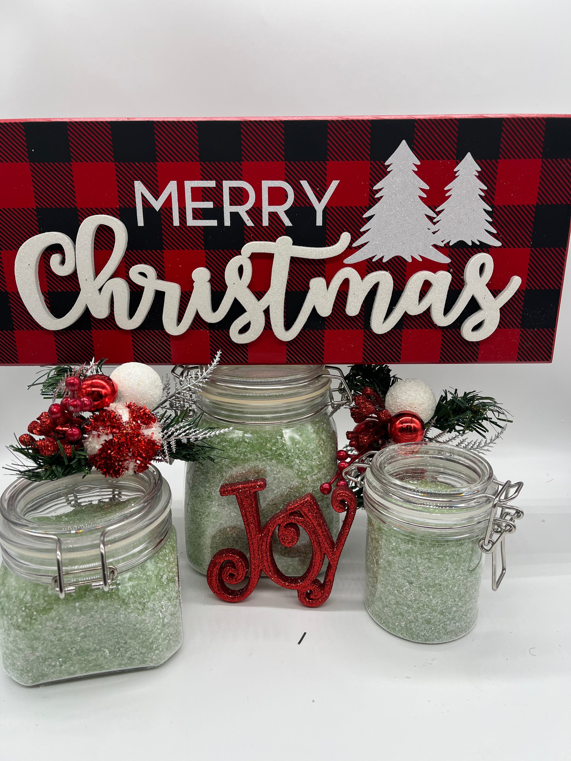 all natural pine scented bath crystals or bath salts on a Christmas themed background