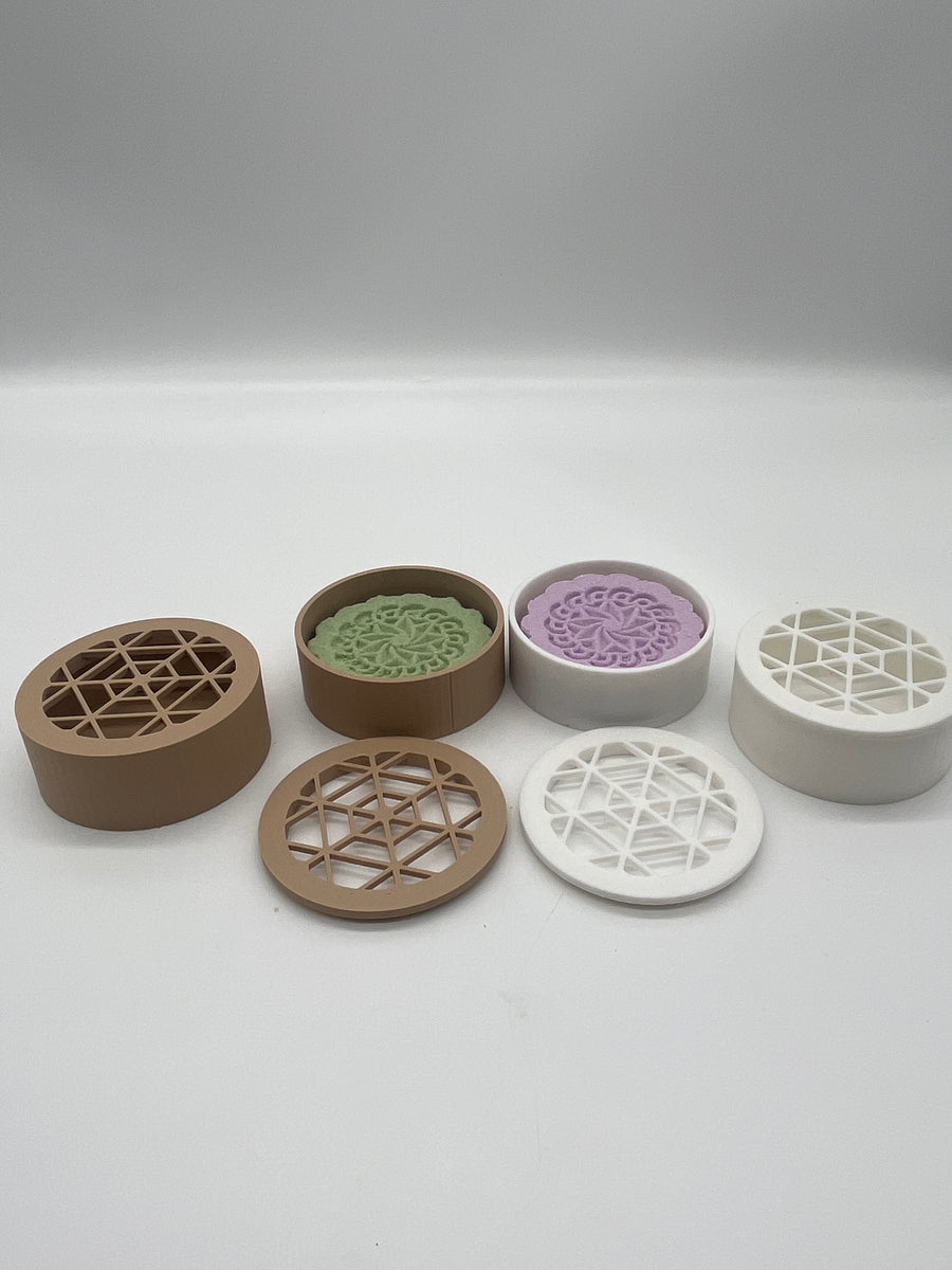 All natural shower steamers and shower steamer caddy's on a white background