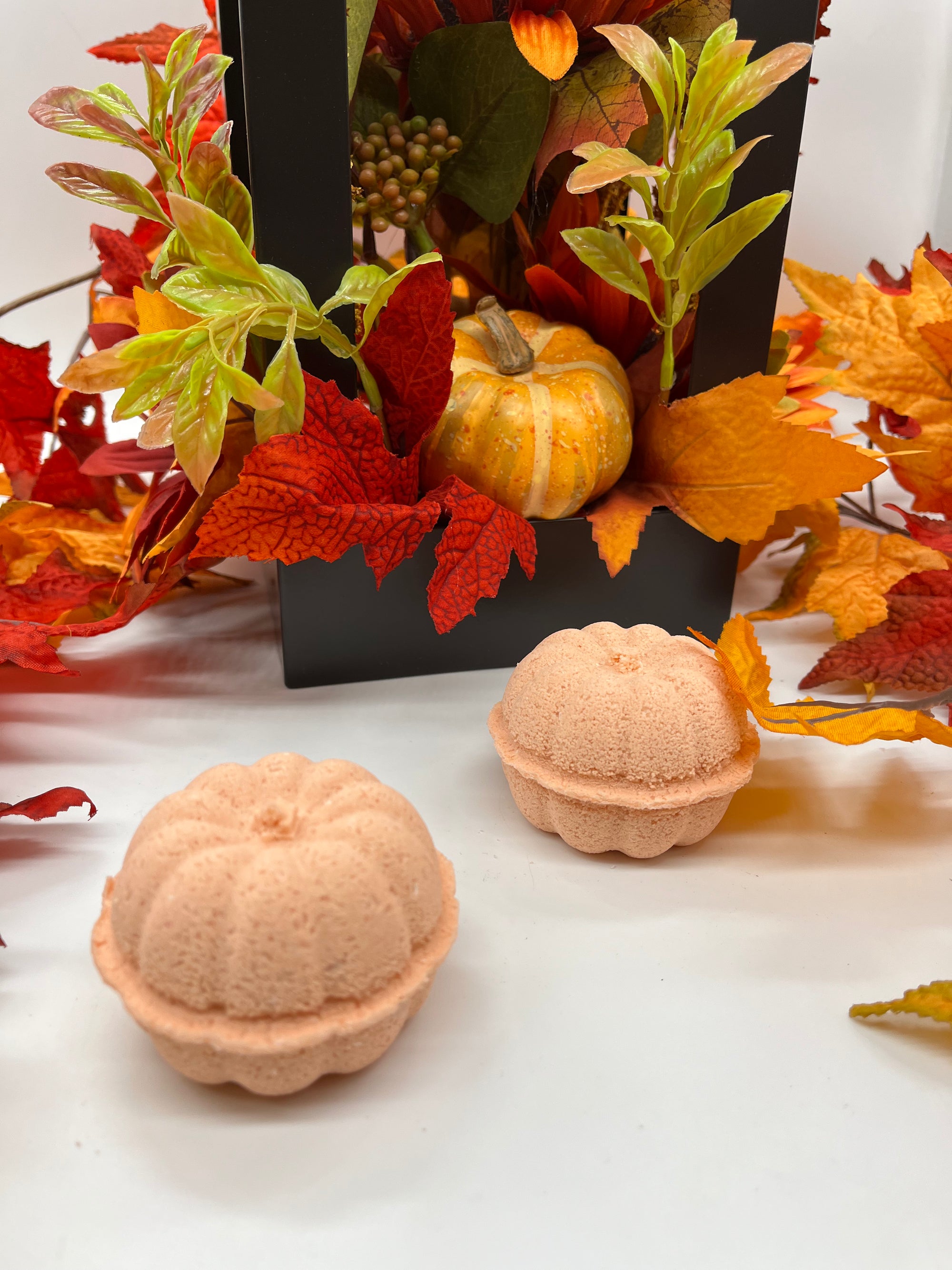 all natural pumpkin spice bath bombs on a fall themed background