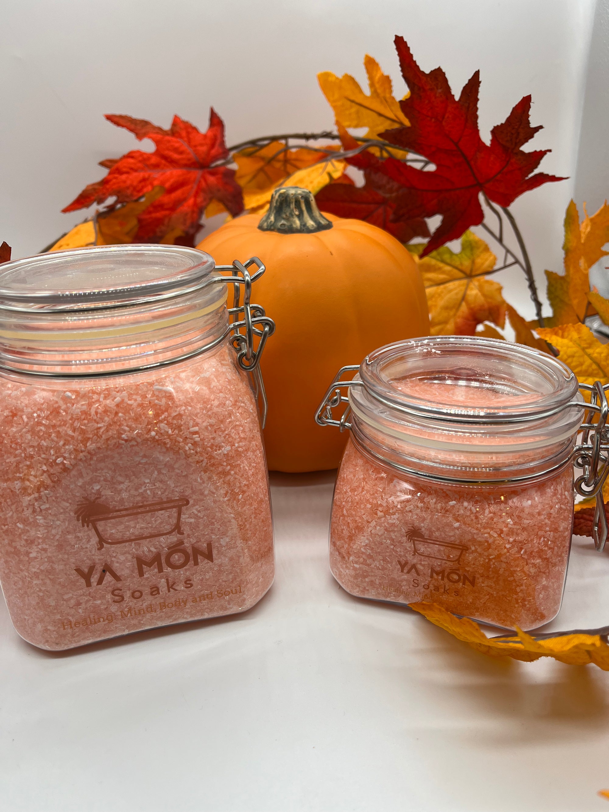 all natural pumpkin spice bath salts with a fall themed background