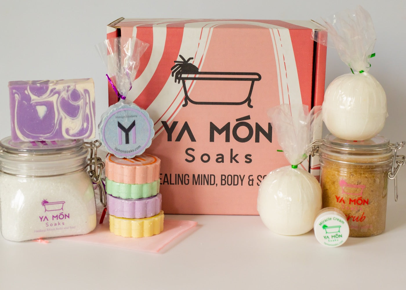 all natural bath crystals or bath salts, soap bars, shower steamers, bath bombs, sugar scrub, and miracle cream