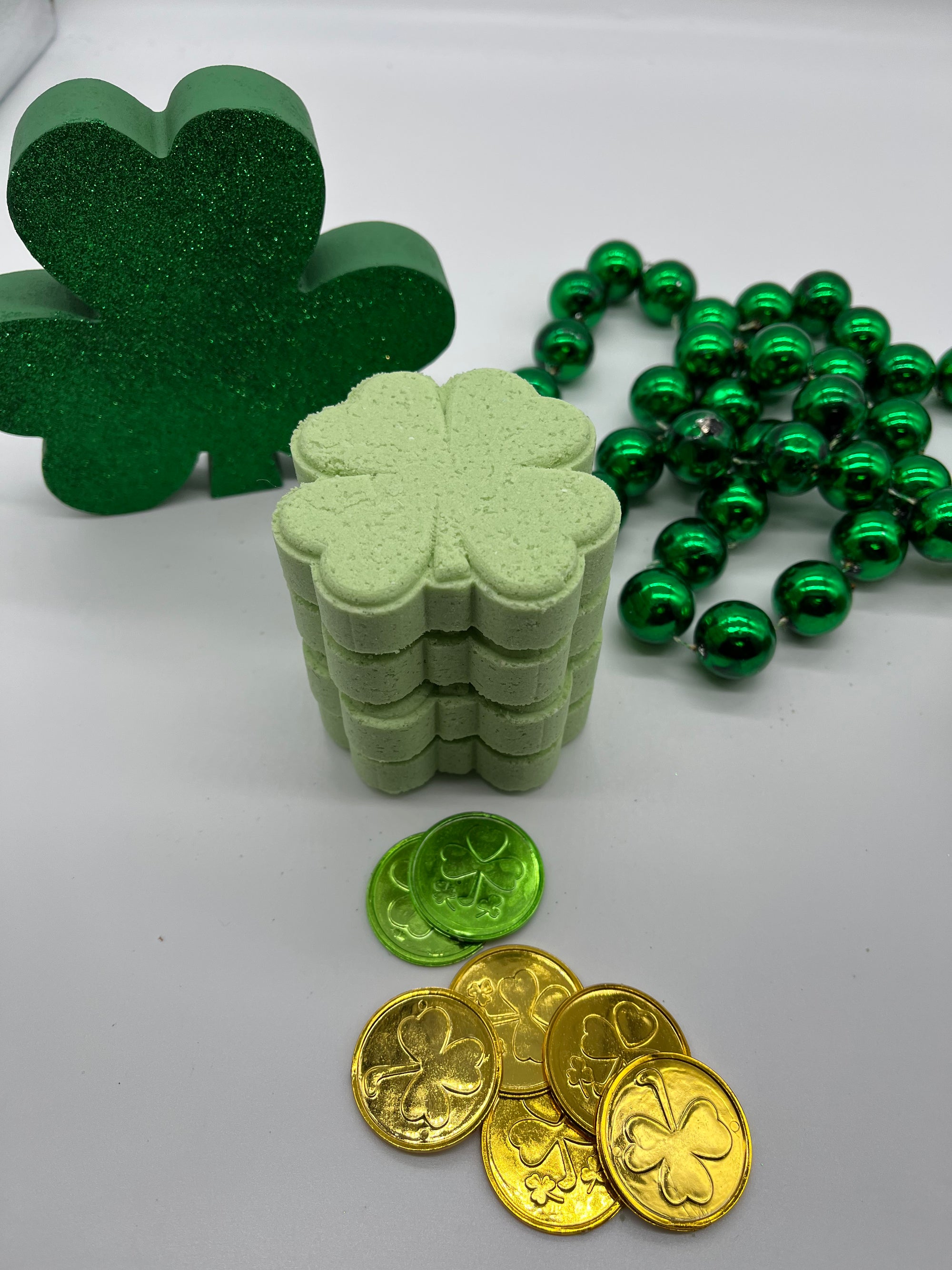 saint patrick's day themed bath bombs shaped like a clover